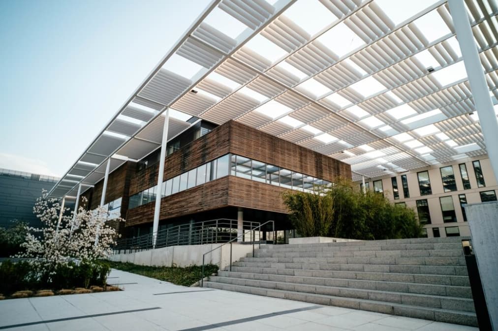 Beautiful modern building- modern architecture and bushes outside near building