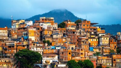 a view of a small town with the mountains behind during sunset in Brazil