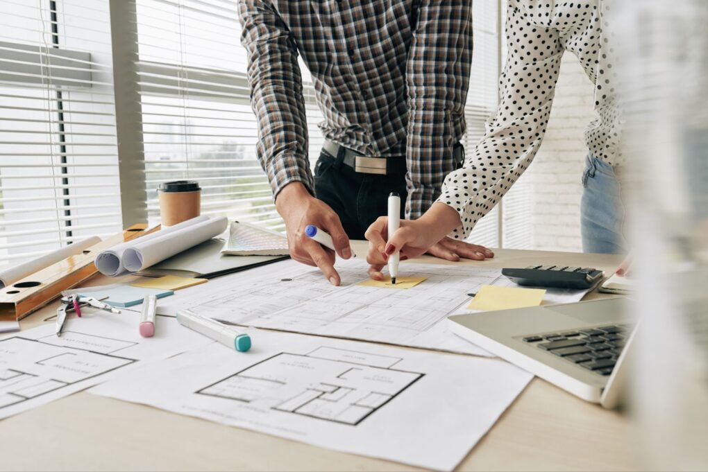 Two men discussing architect project