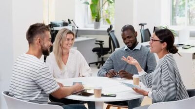 People at the table communicate and socialize